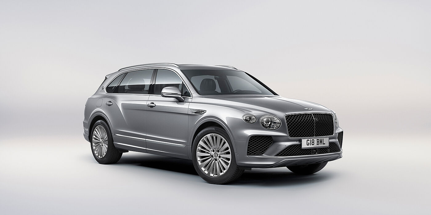 Gohm Sportwagen GmbH | Bentley Stuttgart Bentley Bentayga Extended Wheelbase luxury SUV front three quarter view in Moonbeam paint with 21 inch five spoke painted wheels
