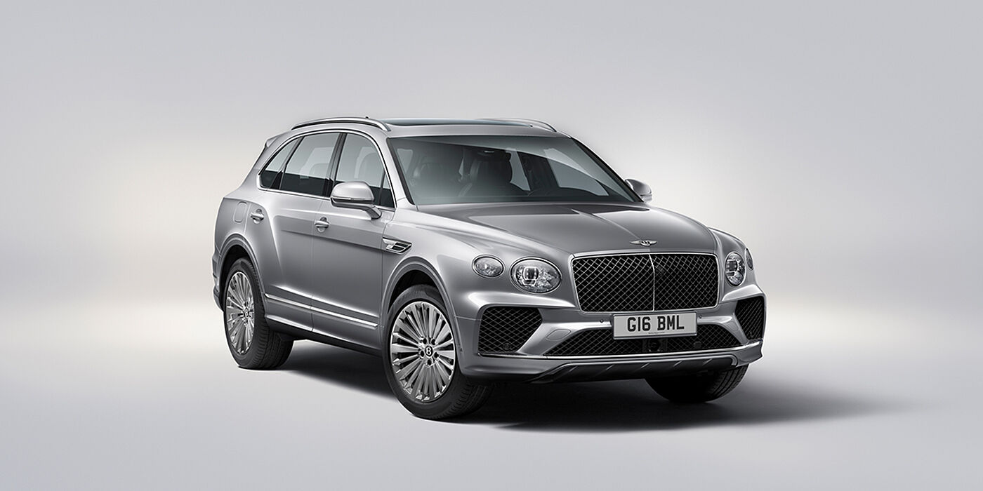 Gohm Sportwagen GmbH | Bentley Stuttgart Bentley Bentayga luxury SUV front three quarter view in Moonbeam paint with matrix grille and 21″ 5 spoke painted wheels