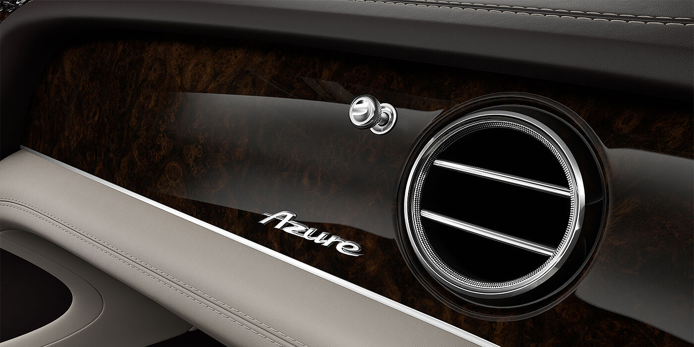 Gohm Sportwagen GmbH | Bentley Stuttgart Bentley Bentayga EWB Azure SUV veneer detail in Dark Stained Burr Walnut with Azure chrome fascia badge