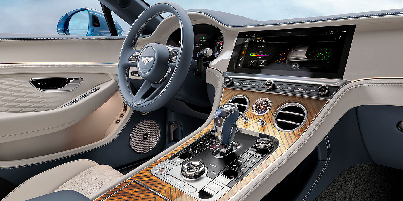Gohm Sportwagen GmbH | Bentley Stuttgart New Bentley Continental GTC Azure convertible interior front cabin view with Linen and Brunel hides and Piano Linen by Mulliner veneer featuring centre console and centre MMI screen