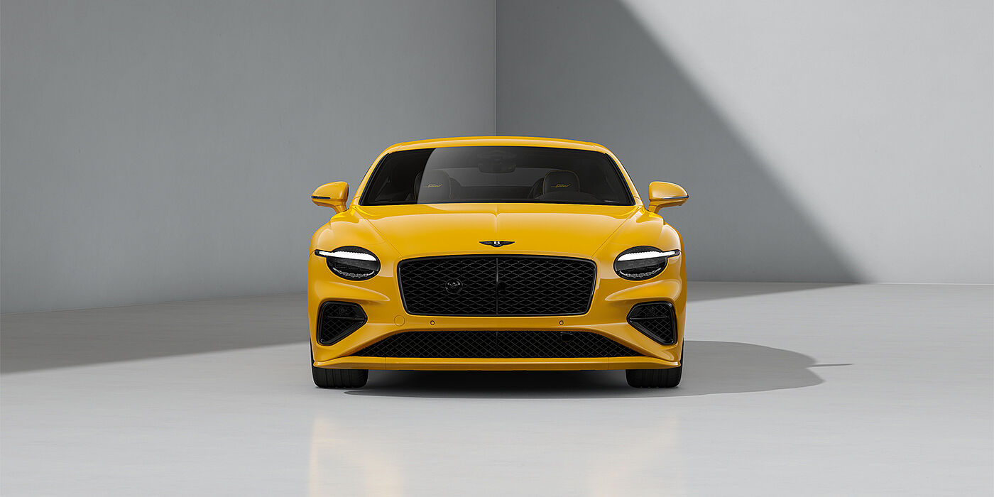 Gohm Sportwagen GmbH | Bentley Stuttgart Bentley Continental GT Speed coupe in Monaco Yellow paint and 22" Ten spoke sport wheels - full front