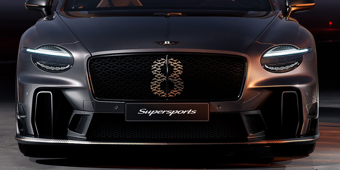 Gohm Sportwagen GmbH | Bentley Stuttgart Bentley Supersports front exterior with illuminated head lamps and Supersports grille in Anthracite paint