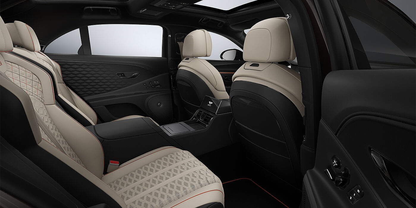 Gohm Sportwagen GmbH | Bentley Stuttgart New Bentley Flying Spur Mulliner sedan rear interior in Portland and Beluga Black hides with Grand Black veneer