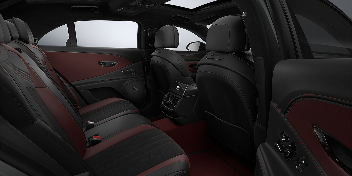 Gohm Sportwagen GmbH | Bentley Stuttgart New Bentley Flying Spur S sedan rear interior in Cricket Ball red  and Beluga black hides with High Gloss Carbon Fibre veneer