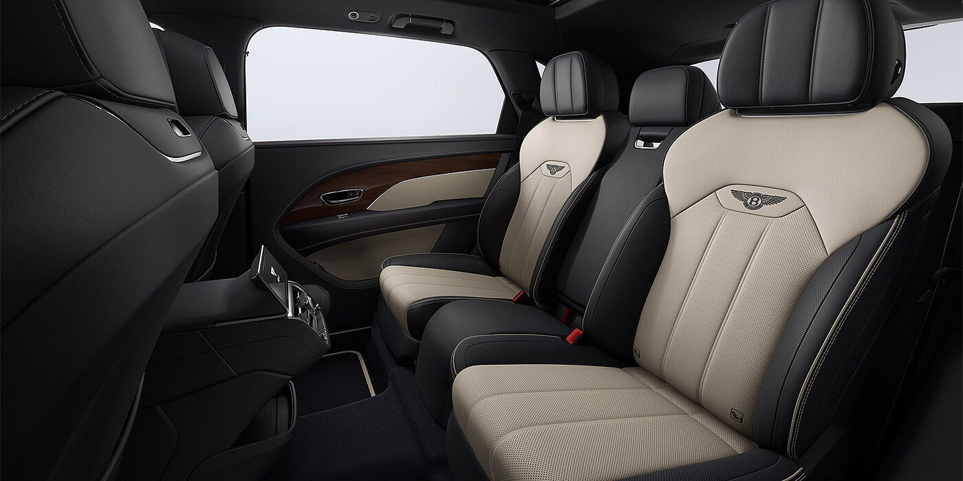 Gohm Sportwagen GmbH | Bentley Stuttgart Bentley Bentayga EWB SUV rear interior in Portland and Imperial Blue hides