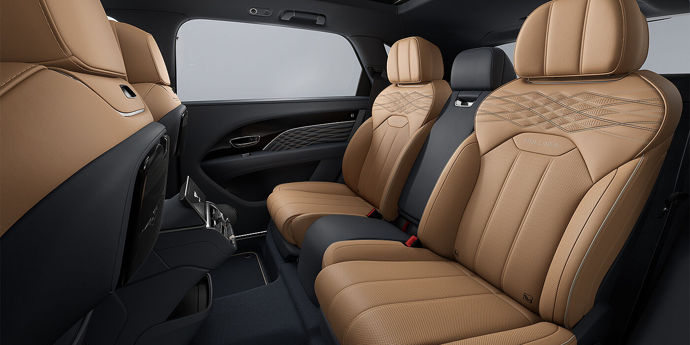 Gohm Sportwagen GmbH | Bentley Stuttgart Bentley Bentayga EWB Mulliner SUV rear interior in Camel and Brunel hides with Mulliner contrast stitching