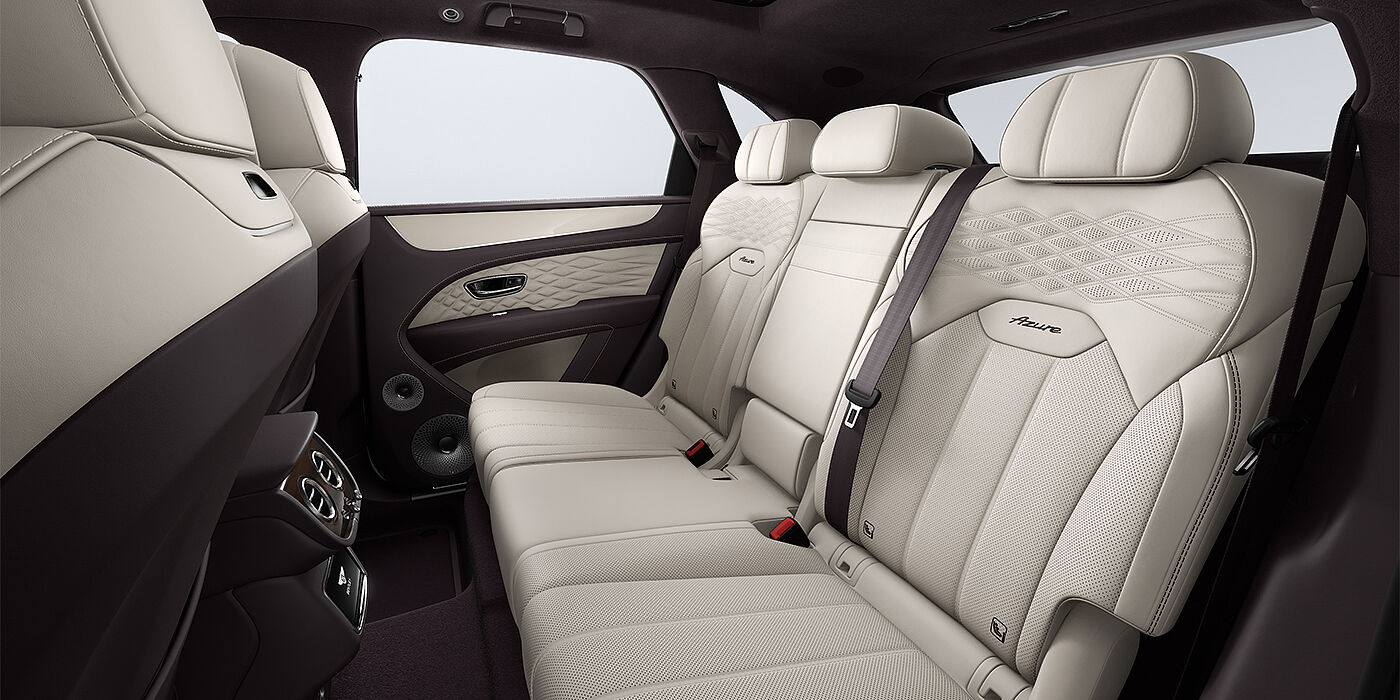 Gohm Sportwagen GmbH | Bentley Stuttgart Bentley Bentayga Azure SUV rear interior in Linen and Damson hides and Azure seat stitching