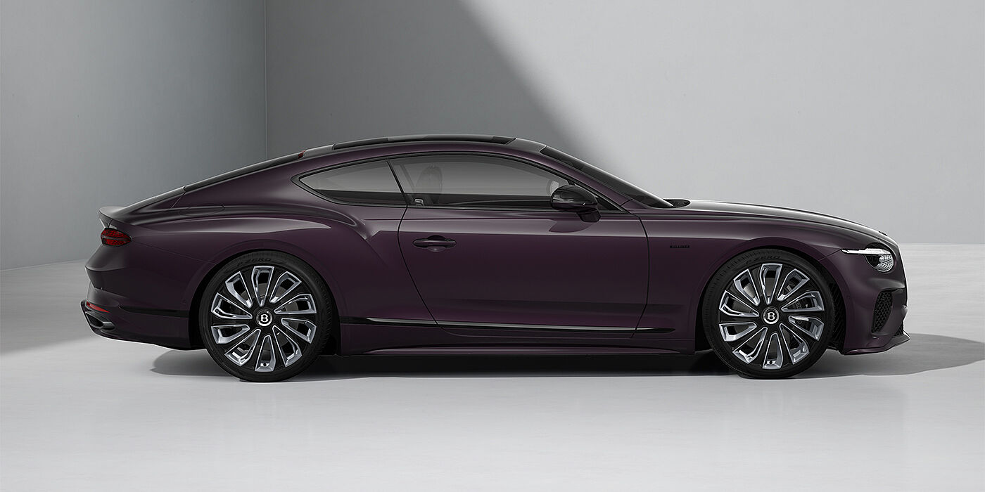Gohm Sportwagen GmbH | Bentley Stuttgart Bentley Continental GT Mulliner coupe in Damson paint and 22" Mulliner wheels - profile 3/4