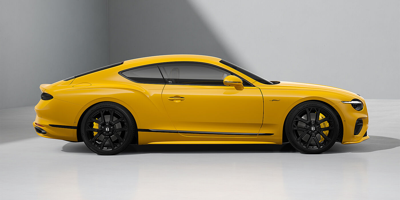 Gohm Sportwagen GmbH | Bentley Stuttgart Bentley Continental GT Speed coupe in Monaco Yellow paint and 22" Ten spoke sport wheels - profile