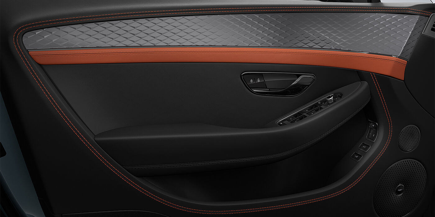 Gohm Sportwagen GmbH | Bentley Stuttgart Bentley Continental GT coupe door interior detail in Newmarket Tan and Beluga black hides with Diamond Brushed Dark Tint Aluminium venee