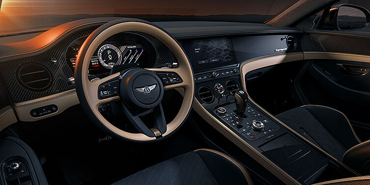 Gohm Sportwagen GmbH | Bentley Stuttgart Bentley Supersports front interior in Beluga and Camel hides with Bronze accents and high gloss black carbon fibre veneer.
