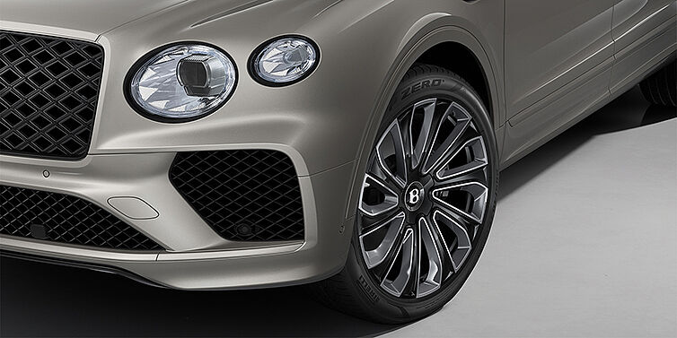 Gohm Sportwagen GmbH | Bentley Stuttgart Bentayga EWB Artenara Edition SUV in Pale Brodgar paint with 22" Mulliner Gloss black wheel close up
