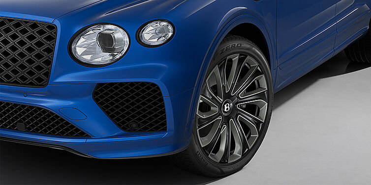 Gohm Sportwagen GmbH | Bentley Stuttgart Bentley Bentayga Artenara Edition SUV front detail in Sequin Blue paint and 22" Mulliner Gloss Black wheels front 3/4