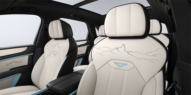 Gohm Sportwagen GmbH | Bentley Stuttgart Bentley Bentayga Artenara Edition SUV front seats in Linen and Beluga Black hides with Light Blue accents and Artenara stitch detail
