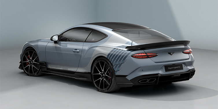 Gohm Sportwagen GmbH | Bentley Stuttgart Bentley Supersports rear three quarter in "Daybreak" Design theme with Jetstream blue paint and Arctica white and Portofino blue paint stripes across the rear haunch.