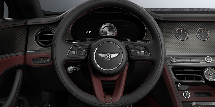 Gohm Sportwagen GmbH | Bentley Stuttgart New Bentley Flying Spur S sedan steering wheel and dash in Cricket Ball red and Beluga black hides and High Gloss Carbon Fibre veneer