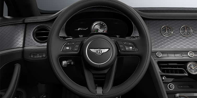 Gohm Sportwagen GmbH | Bentley Stuttgart New Bentley Flying Spur Speed sedan steering wheel and dash in Gravity Grey and Beluga black hides and Diamond Brushed Dark Tint Aluminium veneer