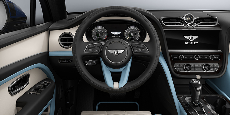 Gohm Sportwagen GmbH | Bentley Stuttgart Bentley Bentayga Artenara Edition SUV steering wheel view in Linen and Beluga Black hides with Light Blue accents and Piano Linen veneer