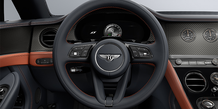 Gohm Sportwagen GmbH | Bentley Stuttgart Bentley Continental GTC S convertible steering wheel and dash in Newmarket Tan and Beluga Black hides with Carbon Fibre veneer