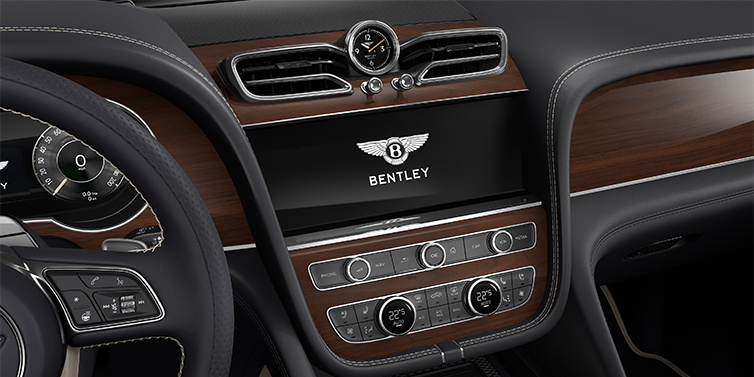 Gohm Sportwagen GmbH | Bentley Stuttgart Bentley Bentayga EWB SUV centre console detail showing Bentley Wings